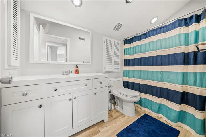 Full Bathroom 2 that is shared with Bedroom 2 and Bedroom 3.