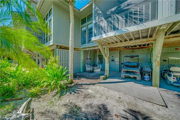 View of Deck, Carport, and 1 Car Attached Garage!