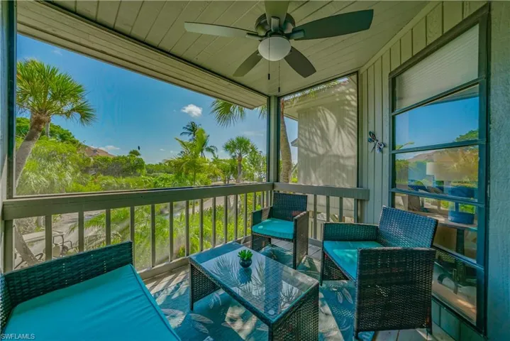 Screened Front Balcony overlooking Court Yard.