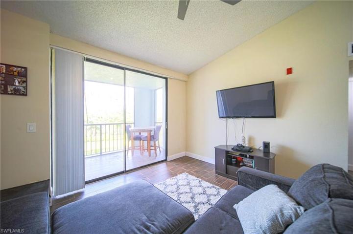 Nice Sized Living Room With Slider Out To Screened Patio!