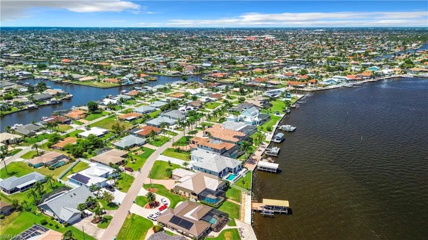 Aerial view with a residential view and a water view