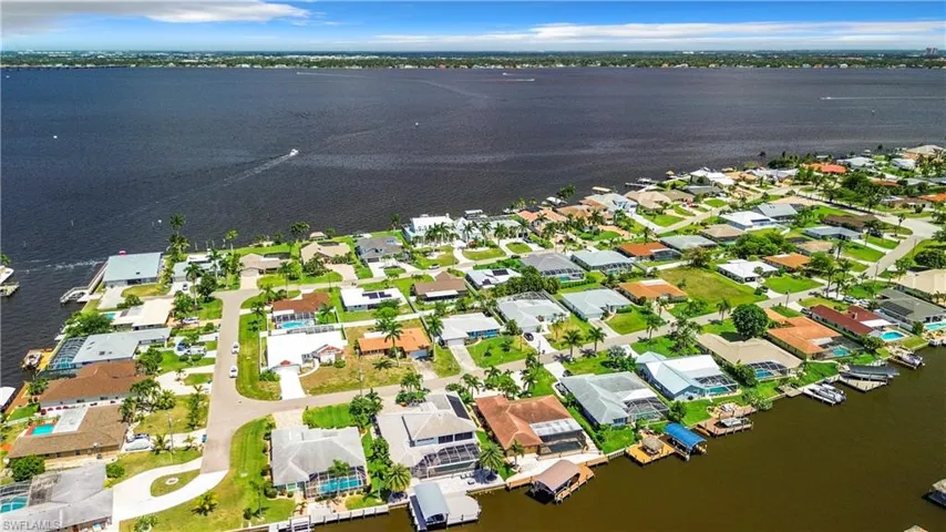 Bird's eye view with a residential view and a water view