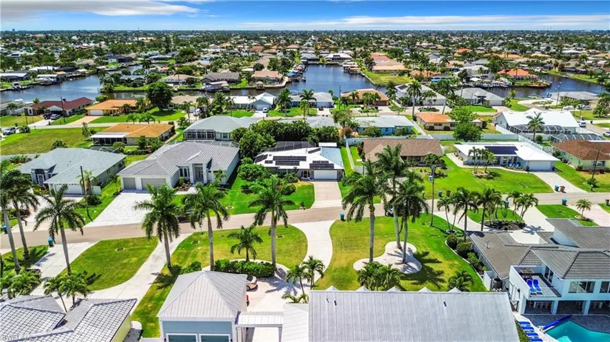 Bird's eye view with a water view and a residential view