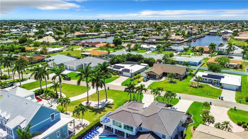 Bird's eye view with a water view and a residential view