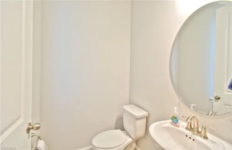 Bathroom with toilet and a sink