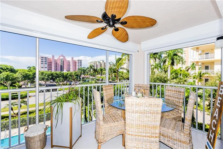 Balcony featuring ceiling fan