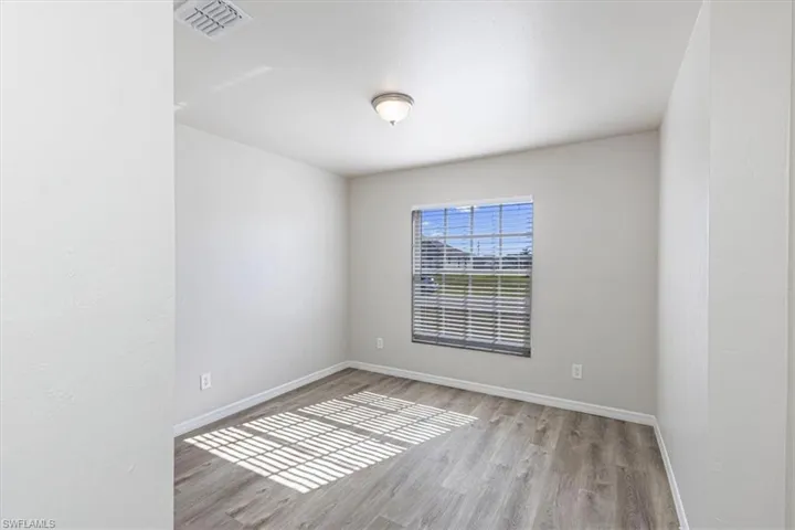 Spare room with light wood finished floors