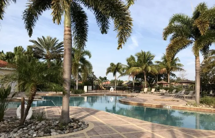 Community pool featuring a patio area