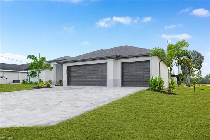 Garage with decorative driveway