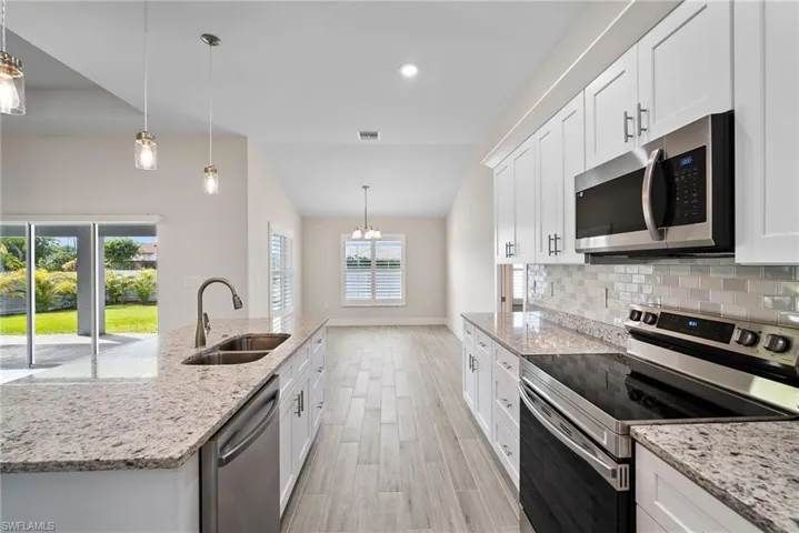 684  Manhattan E ST, Lehigh Acres, FL 33974