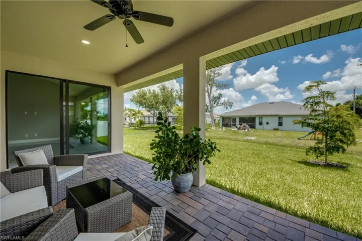 View of patio with ceiling fan