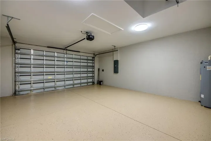 CUSTOM EPOXY FLOORS IN Garage with water heater