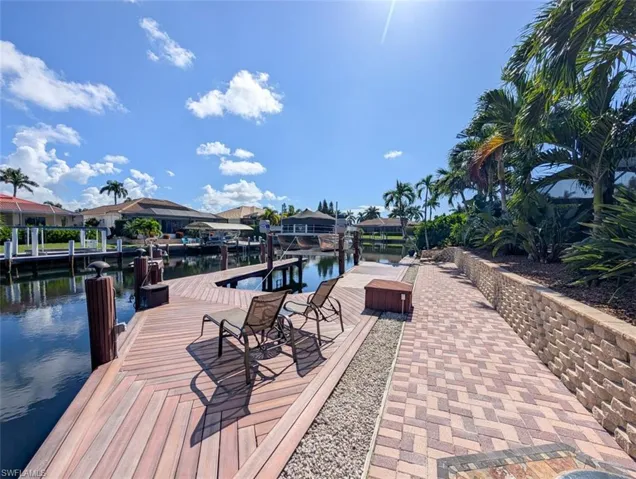 Dock featuring a water view and a residential view
