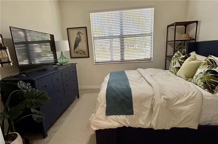 Bedroom featuring baseboards