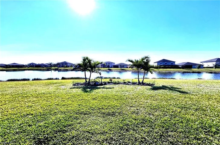 Water view with nearby suburban area