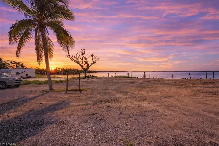 Yard at dusk with a water view