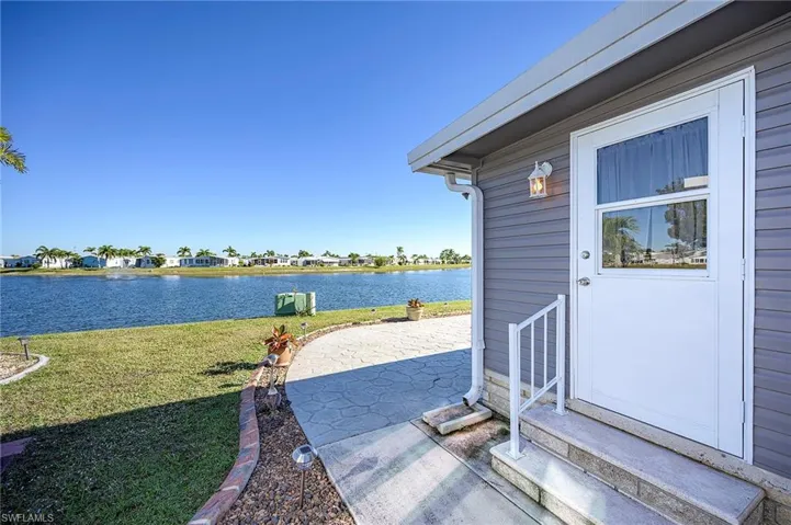 View of patio / terrace featuring a water view