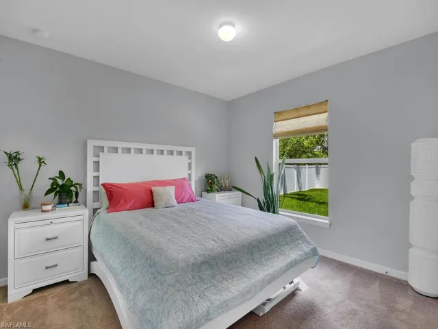 Bedroom with carpet flooring