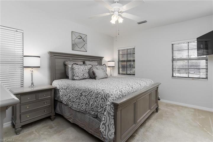 Plenty of windows in main bedroom offering natural light