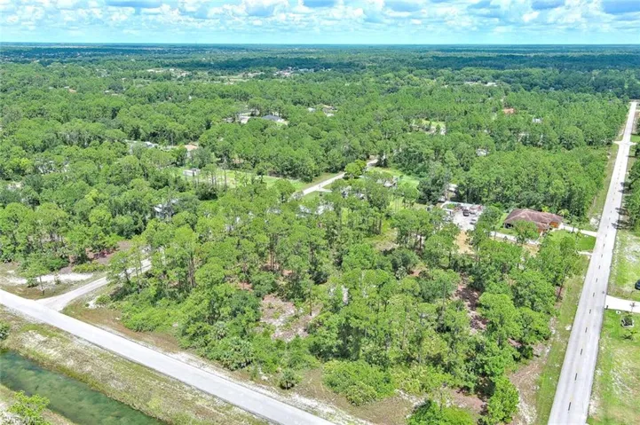 Drone / aerial view of a heavily wooded area