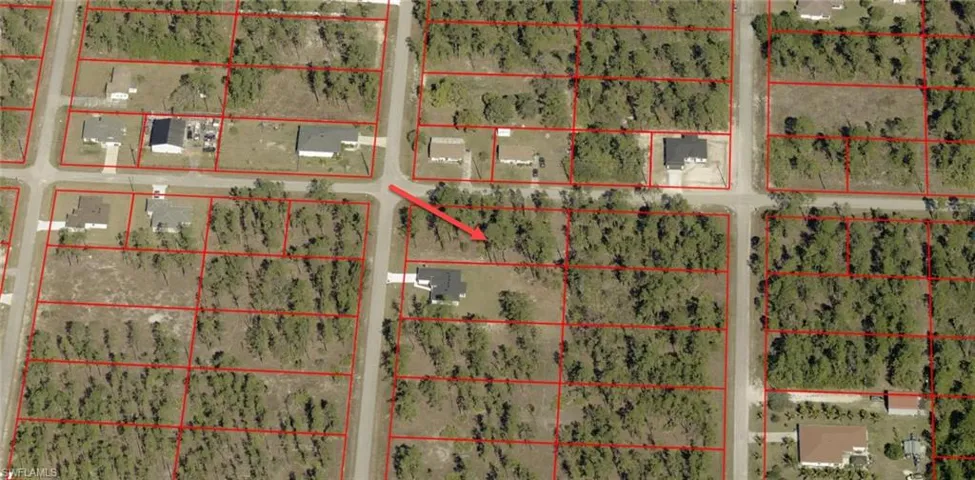 Aerial overview of property's location with property parcel outlined
