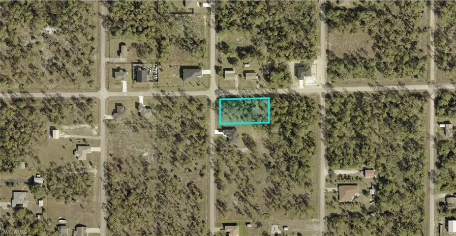 Aerial overview of property's location featuring property parcel outlined