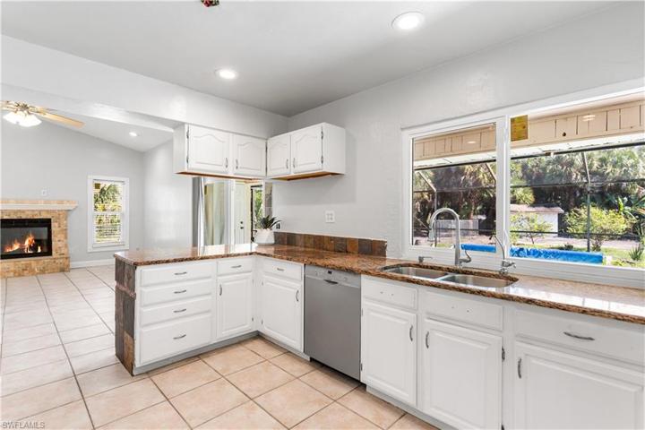 Open kitchen with slide window, perfect for outdoor entertaining