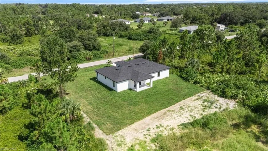 Aerial view of property and surrounding area