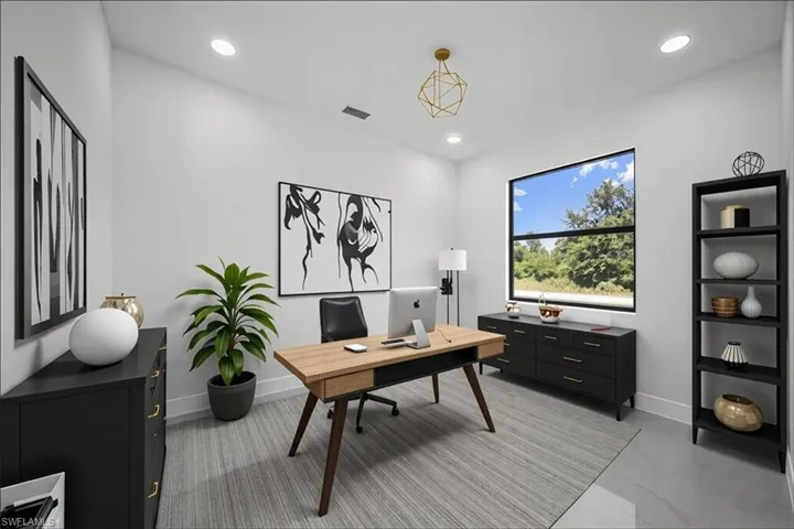 Home office featuring recessed lighting and baseboards