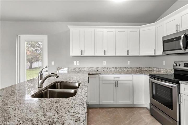 1217 NW 13th PL, CAPE CORAL FL 33993