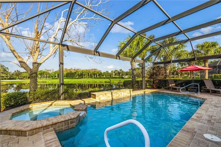 Large Swimming pool with Spa and Fountain is heated by solar.  Picture Window screens maximize the Glorious views