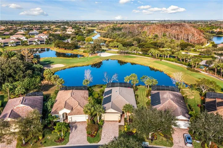 Bird's eye view with views of a Sparkling Lake along with the 16th Tee and Green