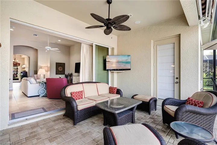 Lanai has wall mounted TV, pocket sliders as well as access doors to make the most of the wonderful Florida Lifestyle
