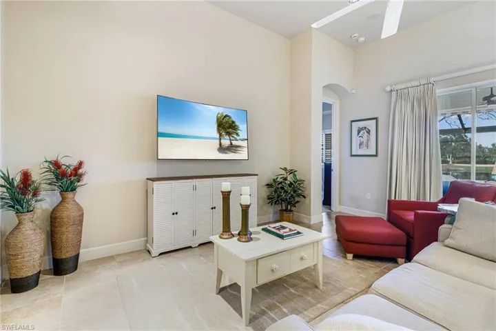 Living room featuring a towering ceiling