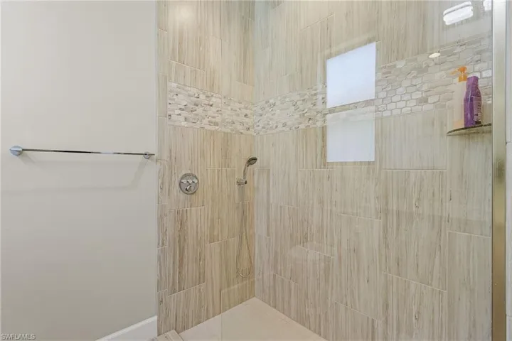 Bathroom with tiled shower