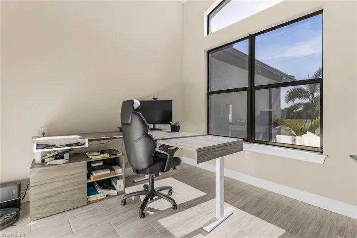 Office space featuring light wood-type flooring