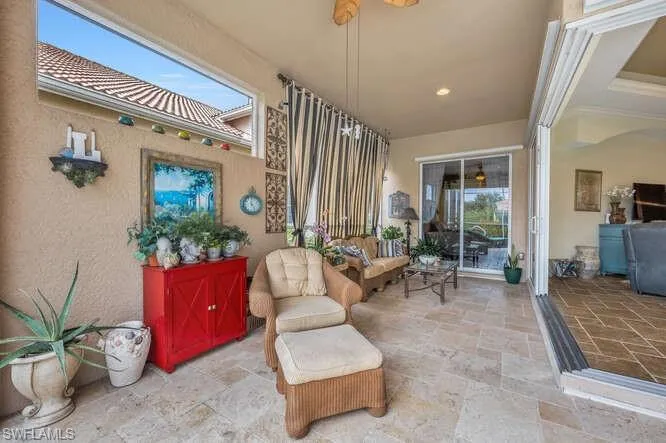 View of patio / terrace with ceiling fan and outdoor lounge area