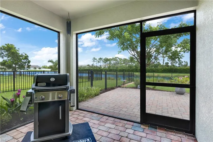 Sunroom with a water view