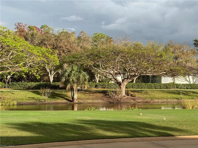 Water view and fountain from screened in porch