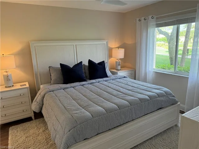 Bedroom featuring abundant light and laminate flooring