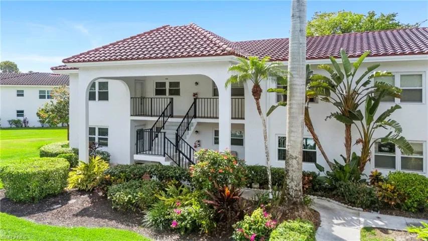 FRONT ELEVATION - 2 STORY BUILDING - TILE ROOF - CORNER SET APART BUILDING...