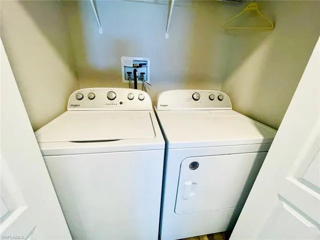 Laundry room featuring washing machine and dryer