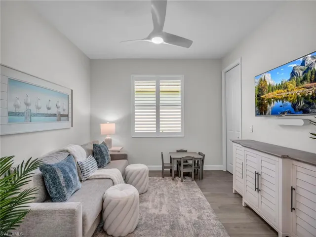 Versatile den with a closet, ideal for use as a fourth bedroom, home office, or flex space.