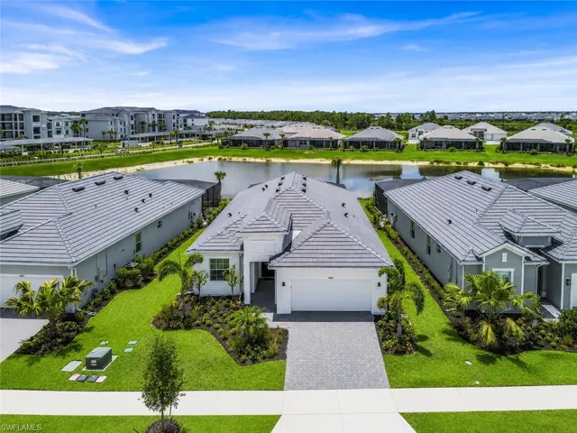 Birds Eye view of home with lake view