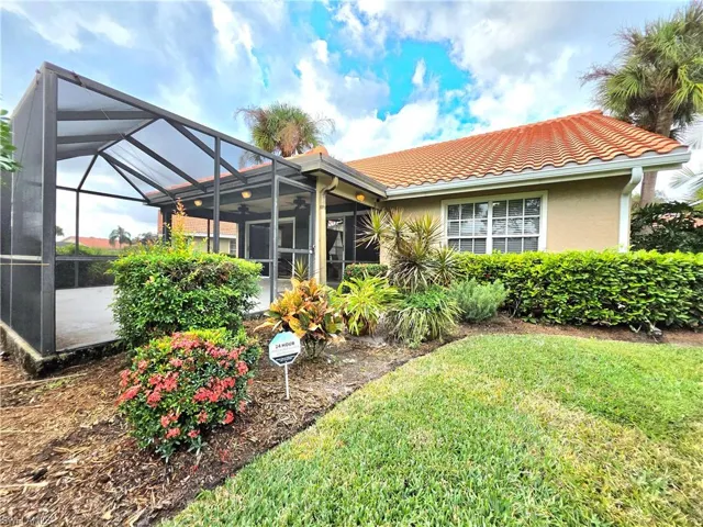 View of patio with a sunroom, ceiling fan, and a lanai