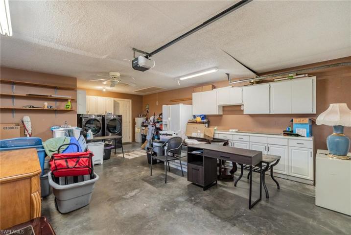 2 car garage with extra cabinet space