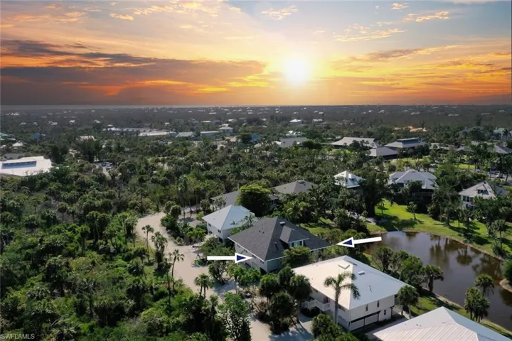 Aerial view at dusk with a water view