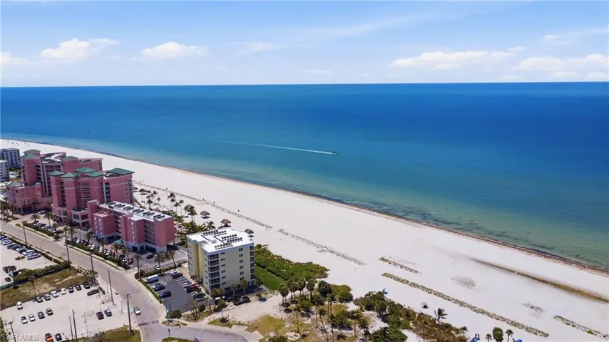 Condo aerial view.  Come play in the white sugar sand.