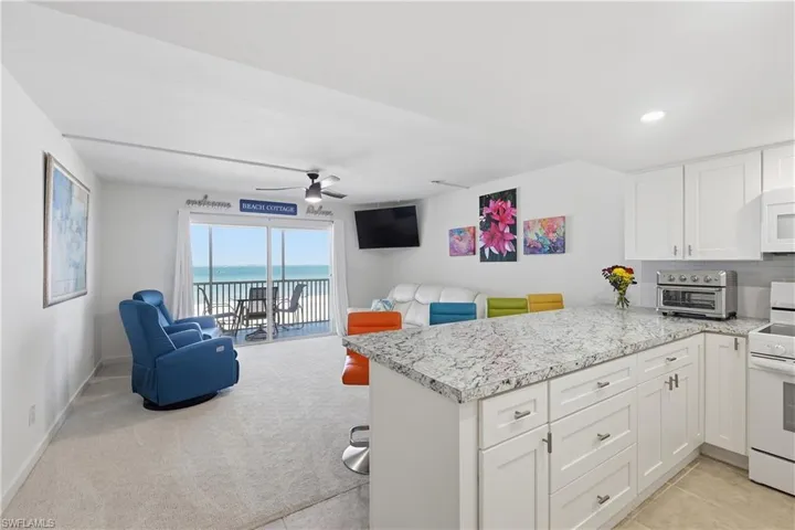 Kitchen and Living Room set-up with balcony overlooking the beautiful Gulf!