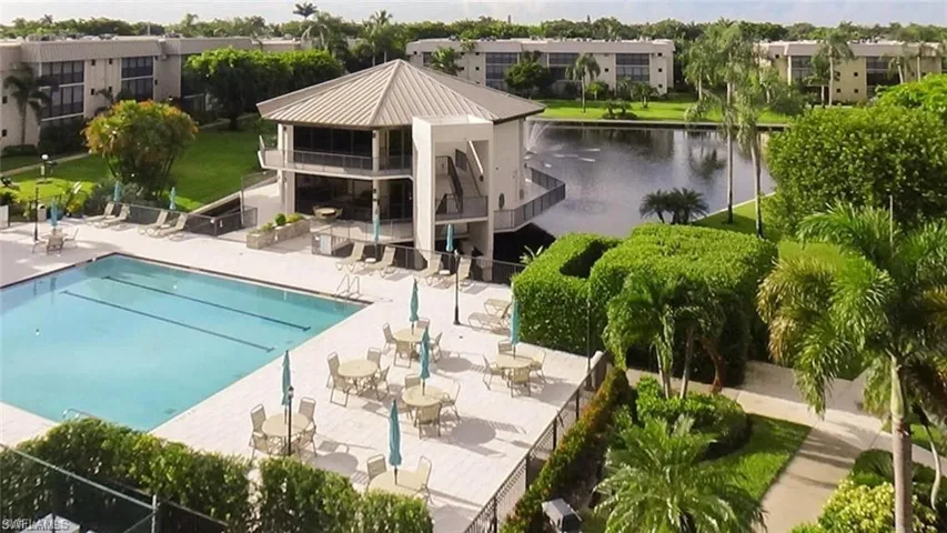Spectacular Community pool featuring a patio and Lake/Fountain view